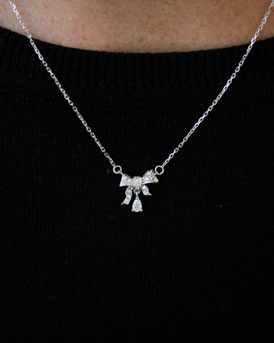 Pendentif Pendentif nœud Art déco pavé de diamants en or blanc 58 Facettes F1970