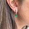 Boucles d'oreilles Boucles d’oreilles pendantes en or gris 18 carats et émeraudes poire 58 Facettes REF24017-181
