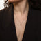 Pendentif Pendentif vintage en or jaune 18 carats, saphirs blancs et diamant 58 Facettes 2508019