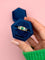 Bague 52 Bague Gypsy en or jaune 18 carats, émeraude et saphirs 58 Facettes 1