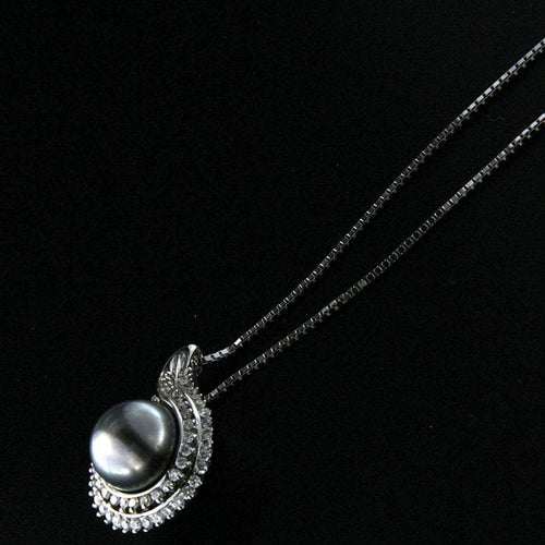 Collier Guidetti - Collier ras-de-cou en or blanc avec perle noire de Tahiti et diamants 58 Facettes G2198