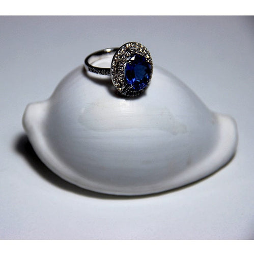 Bague Guidetti - Bague en or blanc avec tanzanite et diamants 58 Facettes G2437