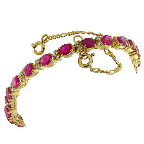 Bracelet Bracelet vintage en or jaune 18 ct avec diamants et rubis 58 Facettes G3886