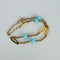 Bracelet Bracelet vintage en or 18 carats avec turquoises 58 Facettes 2601011