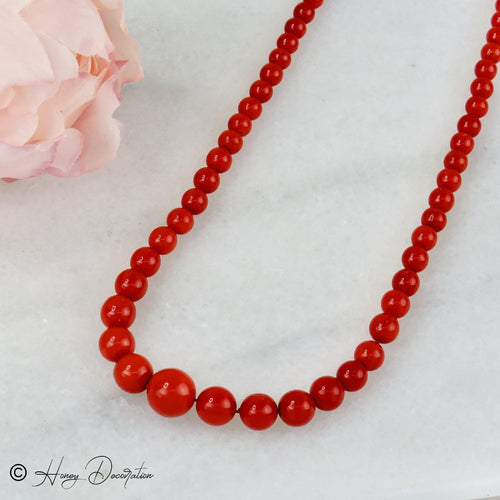Collier Collier en corail avec fermoir en or jaune 18 carats 58 Facettes 2523