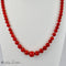 Collier Collier en corail avec fermoir en or jaune 18 carats 58 Facettes 2523