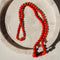 Collier Collier en corail avec fermoir en or jaune 18 carats 58 Facettes 2523