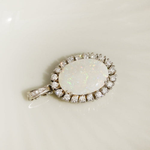 Pendentif Pendentif en platine avec boulder opale et diamants 58 Facettes 2842