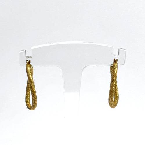 Boucles d'oreilles Créoles ovales torsadées en or 18K texturé 58 Facettes REF2563-331