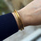 Bracelet Bracelet jonc ouvrant moyen modèle en or jaune 18k 58 Facettes REF2568-336