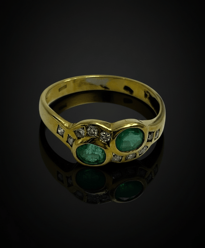 Bague Bague sinuose en or jaune 18 carats avec émeraudes et diamants 58 Facettes