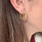 Boucles d'oreilles Créoles torsadées en or jaune 18K 58 Facettes