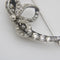 Broche Broche lune croissante à nœud en or et argent, diamants taille ancienne 58 Facettes