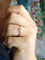 Bague 53 Bague marguerite ancienne en or rose 18 carats, perle et diamants 58 Facettes 1174.5