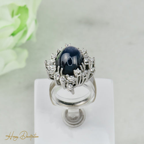 Bague 53.5 Bague en or blanc 750 avec saphir étoilé 15 ct et diamants 58 Facettes 1864