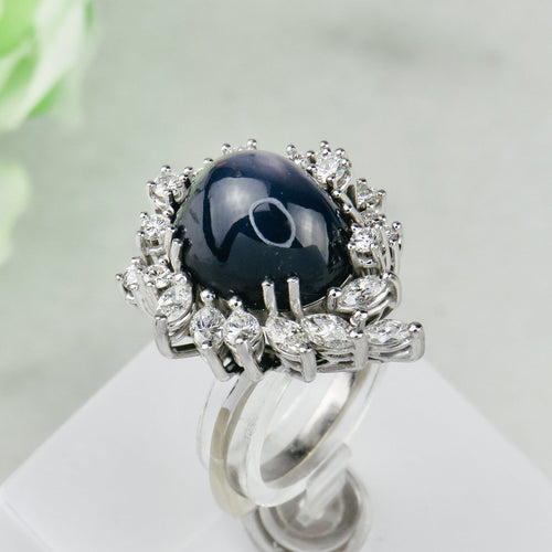 Bague 53.5 Bague en or blanc 750 avec saphir étoilé et diamants 58 Facettes 1864