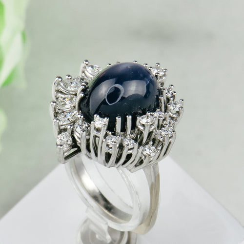 Bague 53.5 Bague en or blanc 750 avec saphir étoilé et diamants 58 Facettes 1864
