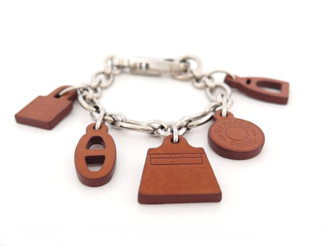 Bracelet Hermès Olga Amulette - Bracelet en cuir Barenia et acier palladié 58 Facettes 265386
