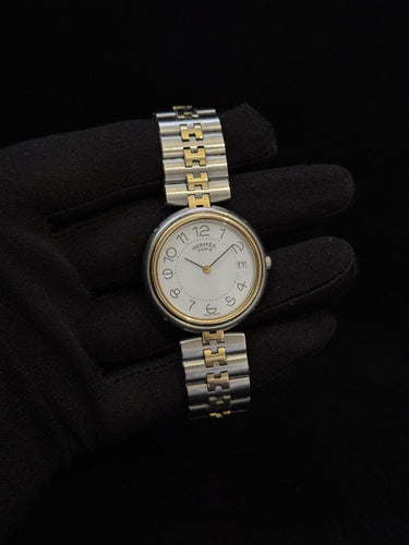 Montre Hermès Clipper - Montre vintage quartz en or et acier 58 Facettes