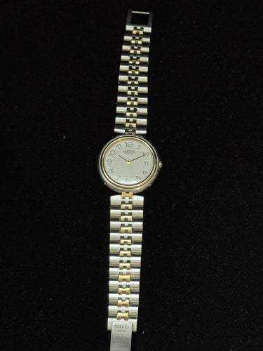 Montre Hermès Clipper - Montre vintage quartz en or et acier 58 Facettes