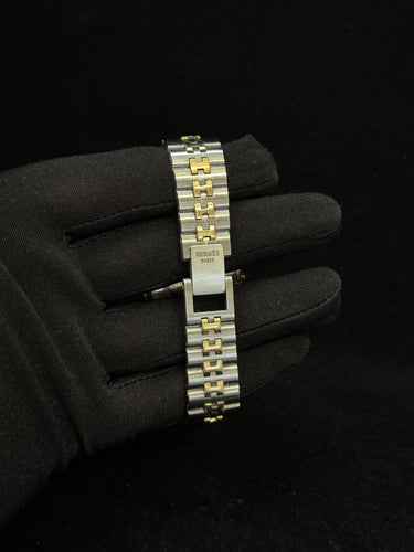 Montre Hermès Clipper - Montre vintage quartz en or et acier 58 Facettes