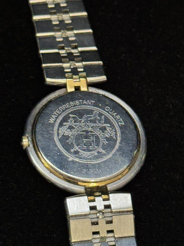 Montre Hermès Clipper - Montre vintage quartz en or et acier 58 Facettes