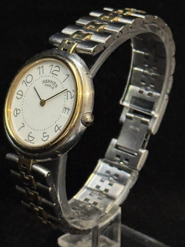 Montre Hermès Clipper - Montre vintage quartz en or et acier 58 Facettes