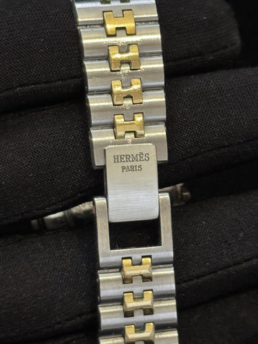 Montre Hermès Clipper - Montre vintage quartz en or et acier 58 Facettes