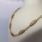 Collier Collier filigrane ajouré en or jaune 18K 13,19 g 58 Facettes 250193