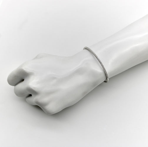 Bracelet Bracelet jonc contemporain en or blanc 18k et diamants 58 Facettes A2005B