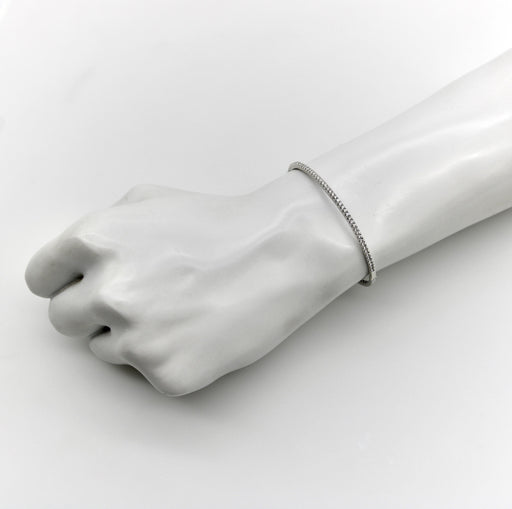 Bracelet Bracelet jonc contemporain en or blanc 18k et diamants 58 Facettes A2005B