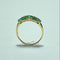 Bague 58 Bague en or jaune 18K avec diamants 0,16 ct et pierres vertes 58 Facettes 250277