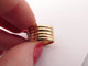 Bague 46 Bague Pinky 5 rangs en or jaune 18k, diamants et pierres précieuses 58 Facettes 272708