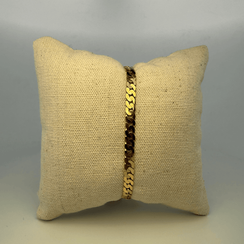 Gourmette maille anglaise en or jaune 18 carats 58 Facettes 250012