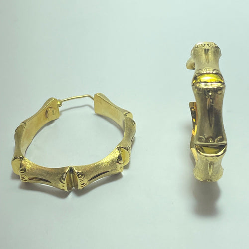 Boucles d'oreilles Boucles d’oreilles créoles bambou en or jaune 18 carats 58 Facettes 250094