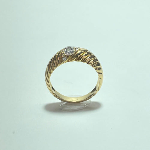 Bague 47 Bague torsadée en or jaune 18K et diamants 0,32 ct 58 Facettes 250336