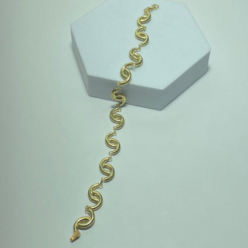 Bracelet Bracelet à maillons ondulés en or jaune 14K 11,82 g 58 Facettes 250255