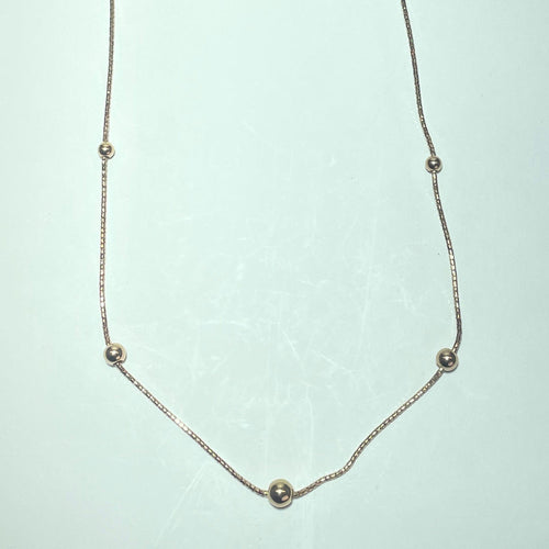 Collier Collier perlé en or jaune 14K 58 Facettes 250324