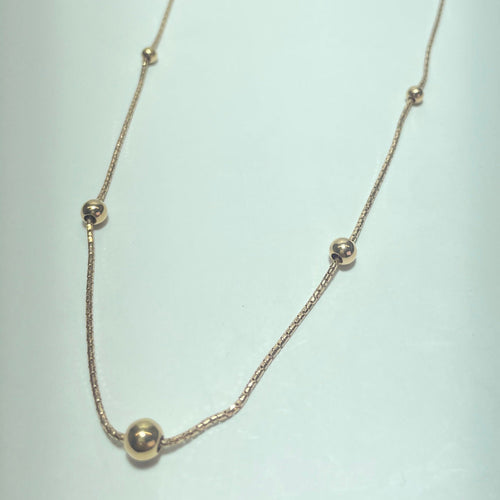 Collier Collier perlé en or jaune 14K 58 Facettes 250324