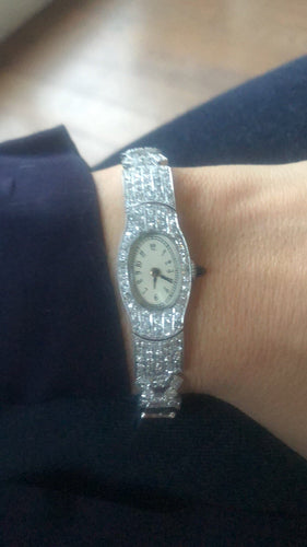 Montre Montre Art Déco ovale en platine et diamants 2,50 cts 58 Facettes 1