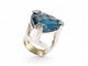 Bague 54 Bague cocktail en or blanc 18k, topaze London blue et diamants 0,25 ct (T54) 58 Facettes 270140