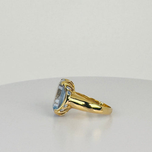 Bague Bague vintage en or jaune 18 carats avec topaze bleue 58 Facettes 2501010