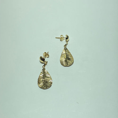 Boucles d'oreilles Boucles d’oreilles pendantes feuille texturée en or jaune 18 carats 58 Facettes 250232