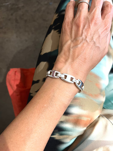 Bracelet Hermès - Bracelet Cassiopé en argent 925 et saphirs blancs 58 Facettes 0