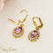 Boucles d'oreilles Boucles d’oreilles vintage en or jaune 14 carats et améthystes 58 Facettes 2788