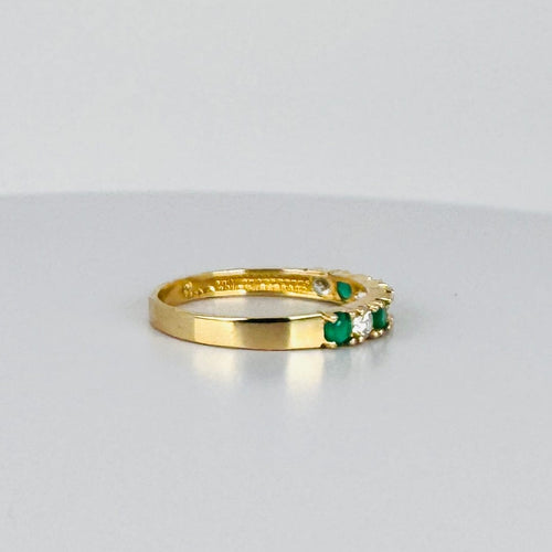 Bague Bague alliance vintage en or jaune 14k avec saphirs blancs et émeraudes 58 Facettes 2512019