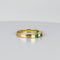 Bague Bague alliance vintage en or jaune 14k avec saphirs blancs et émeraudes 58 Facettes 2512019