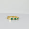Bague Bague alliance vintage en or jaune 14k avec saphirs blancs et émeraudes 58 Facettes 2512019