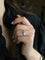 Bague 53 Bague Art déco à gradins en platine et diamants 58 Facettes 1125