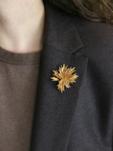 Broche OJ Perrin - Broche étoile en or jaune 18 carats 58 Facettes 1126.3